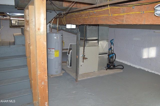 basement featuring electric water heater