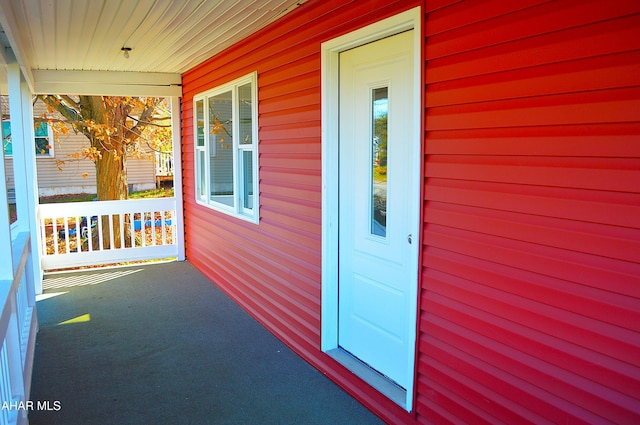 entrance to property with covered porch