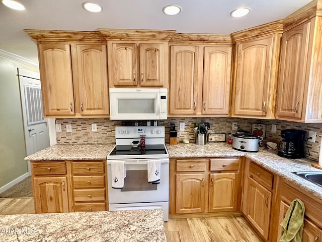 1650 Adams Run Rd, New Paris, PA 15554 - kitchen featuring white appliances, light wood-type flooring, tasteful backsplash, light brown cabinetry, and recessed lighting