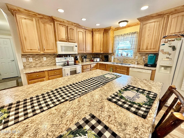 1650 Adams Run Rd, New Paris, PA 15554 - kitchen with white appliances, a sink, arched walkways, recessed lighting, and decorative backsplash