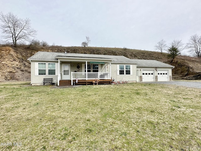 1650 Adams Run Rd, New Paris, PA 15554 - ranch-style house with driveway, an attached garage, a front yard, covered porch, and roof with shingles