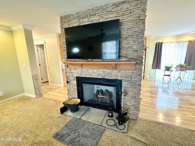 1650 Adams Run Rd, New Paris, PA 15554 - detailed view of crown molding, baseboards, a fireplace, and wood finished floors
