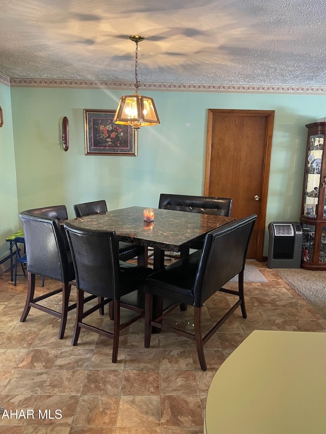 dining room featuring a textured ceiling