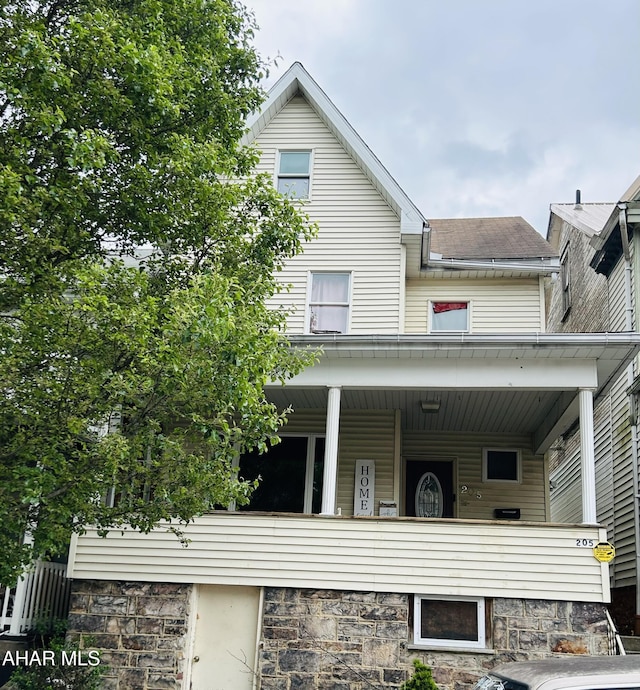 205 1st Ave, Altoona, PA 16602 - view of front facade with covered porch and stone siding