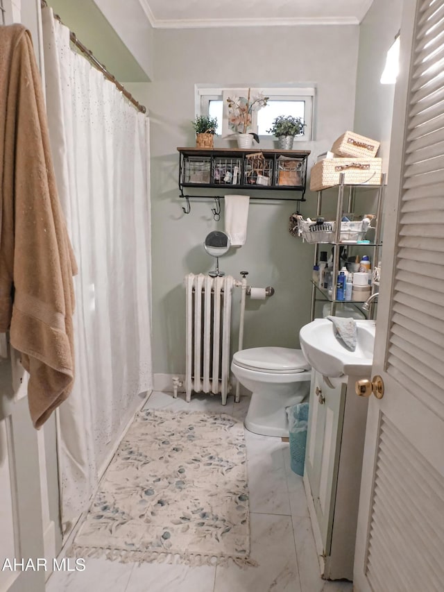 bathroom featuring radiator heating unit, sink, toilet, crown molding, and a shower with shower curtain