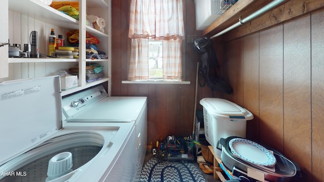 2414 4th Ave, Altoona, PA 16602 - washroom featuring washing machine and dryer and wood walls