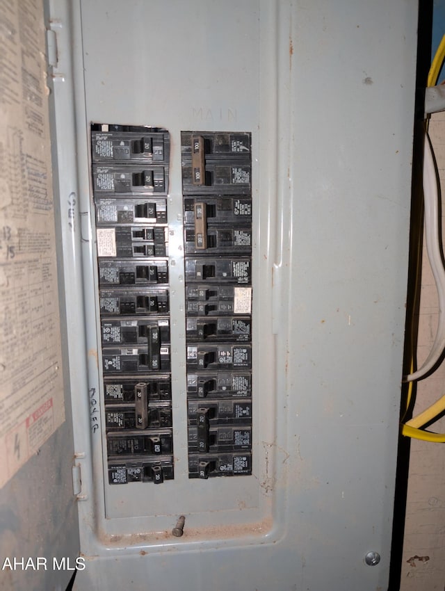 utility room featuring electric panel