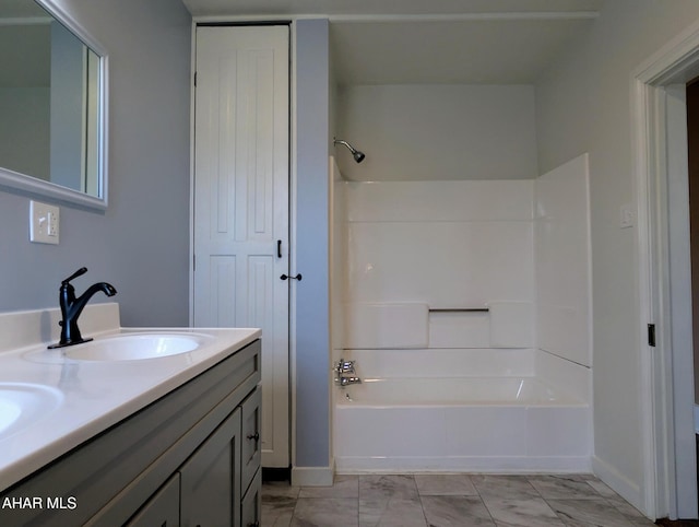 bathroom featuring vanity and bathtub / shower combination