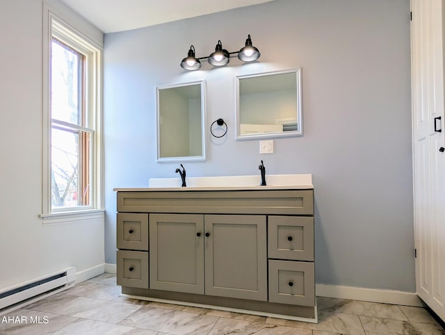 bathroom featuring vanity and a baseboard radiator