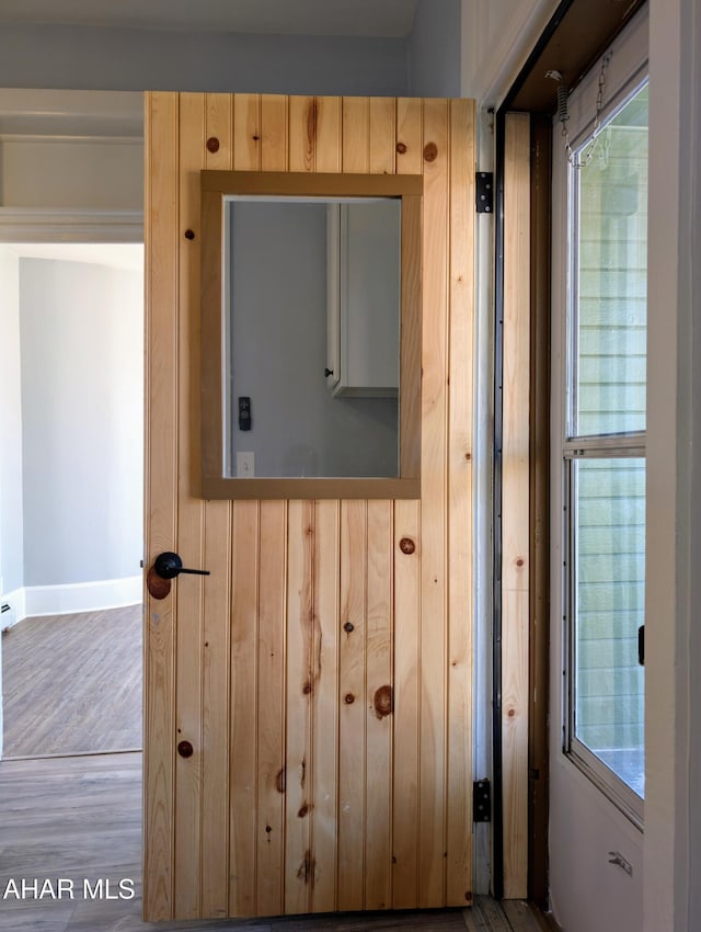 details featuring wood-type flooring