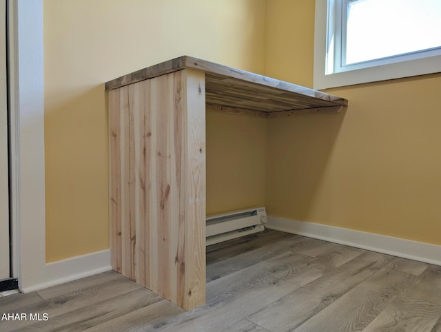 interior space with baseboard heating