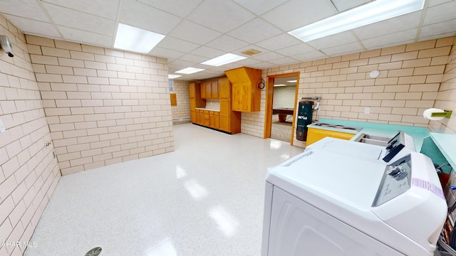 79 Mill Rd, Duncansville, PA 16635 - washroom with tile walls and separate washer and dryer
