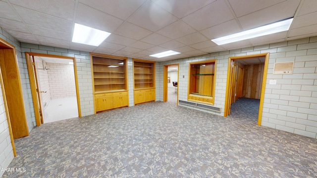 79 Mill Rd, Duncansville, PA 16635 - carpeted empty room with a drop ceiling and built in features
