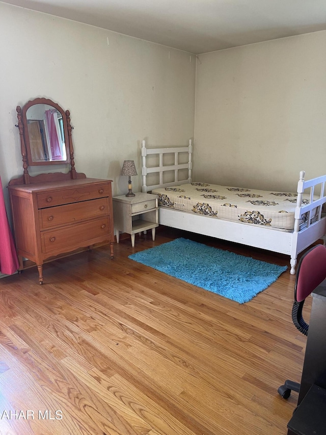 bedroom featuring light hardwood / wood-style flooring