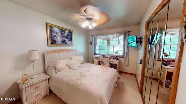 4701 Lynndale Rd, Altoona, PA 16602 - bedroom with a closet, light carpet, and ceiling fan