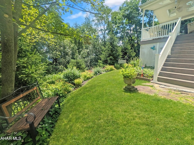4701 Lynndale Rd, Altoona, PA 16602 - view of green lawn with stairs and a ceiling fan
