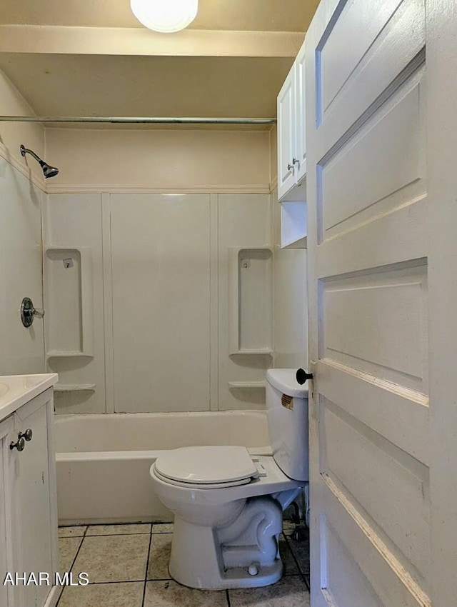 full bathroom featuring toilet, tile patterned flooring, vanity, and shower / bathing tub combination