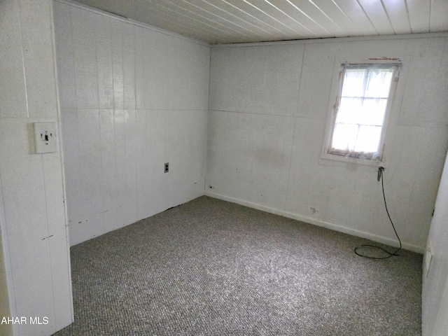 empty room with carpet flooring