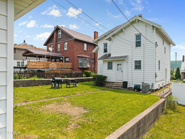 1108 22nd Ave, Altoona, PA 16601 - back of property with entry steps and cooling unit