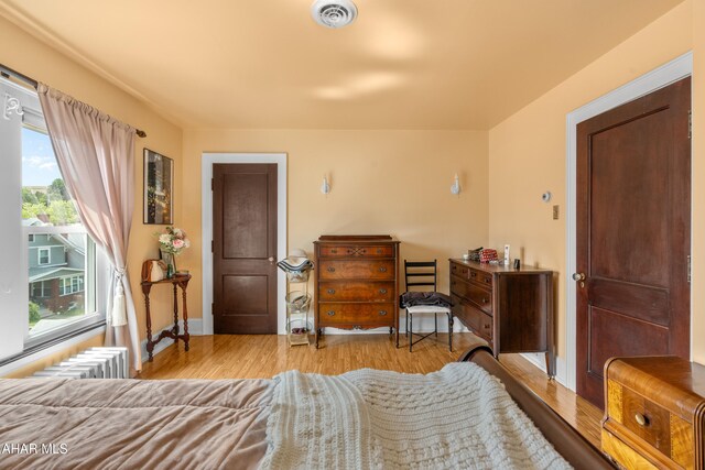 1108 22nd Ave, Altoona, PA 16601 - bedroom featuring radiator and wood finished floors