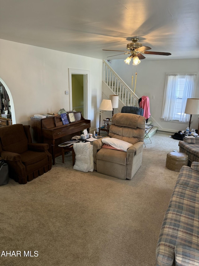 512 26th Ave, Altoona, PA 16601 - carpeted living room featuring a ceiling fan and stairs