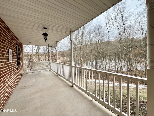 balcony featuring covered porch