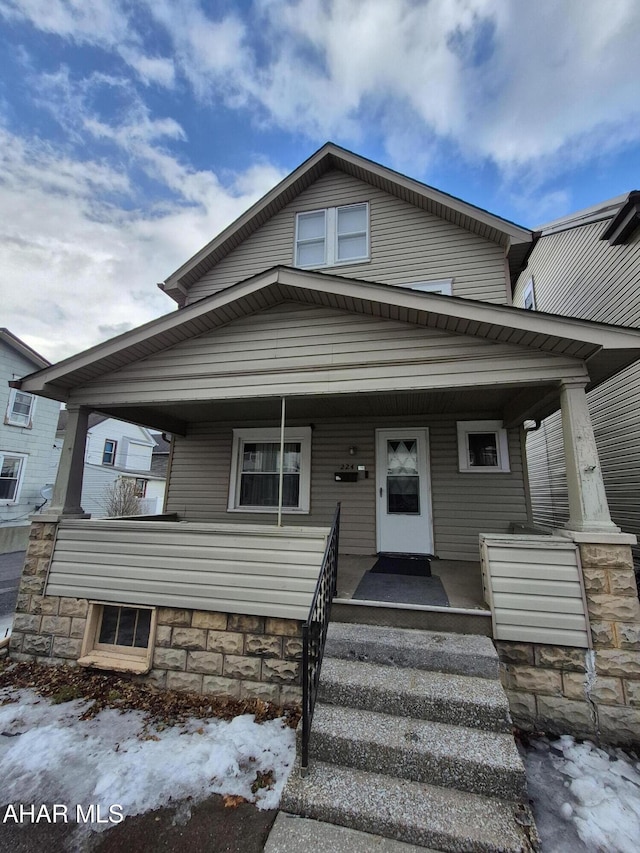 view of front of home featuring covered porch