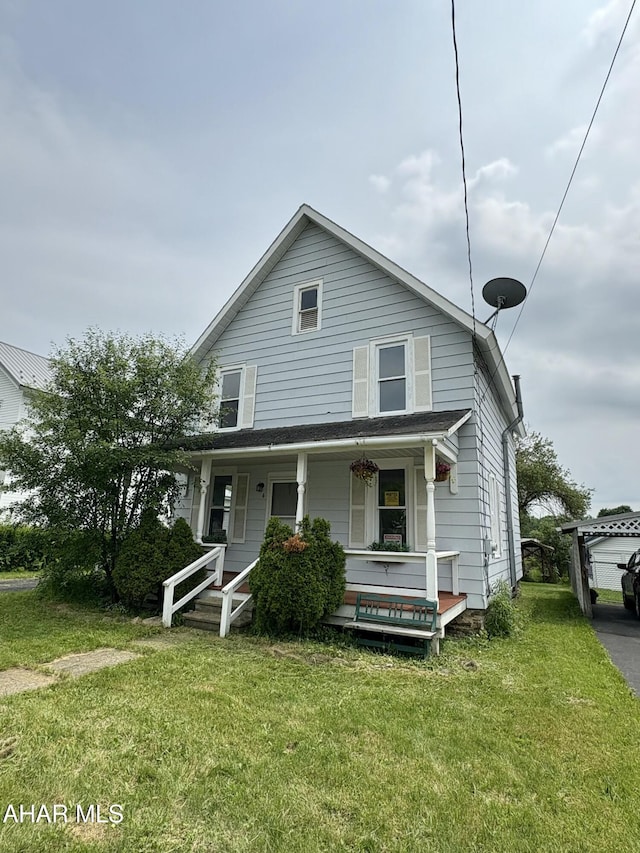 6 B St, Coudersport, PA 16915 - view of front of property with a porch and a front lawn