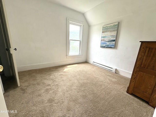 6 B St, Coudersport, PA 16915 - unfurnished bedroom featuring baseboard heating, lofted ceiling, and carpet