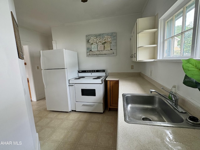 6 B St, Coudersport, PA 16915 - kitchen with white appliances, light countertops, and light floors