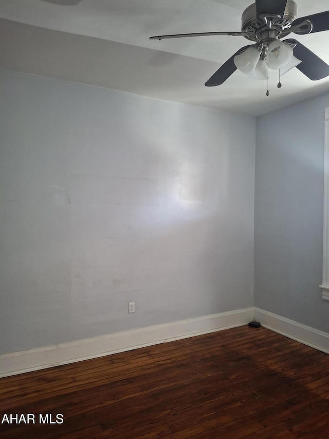 empty room with hardwood / wood-style floors