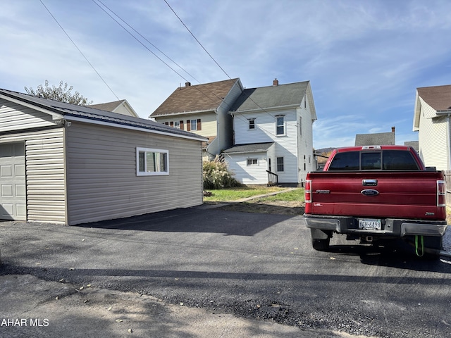 exterior space with a garage