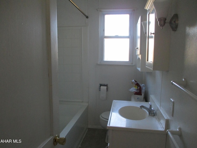 bathroom with vanity, toilet, and tub / shower combination