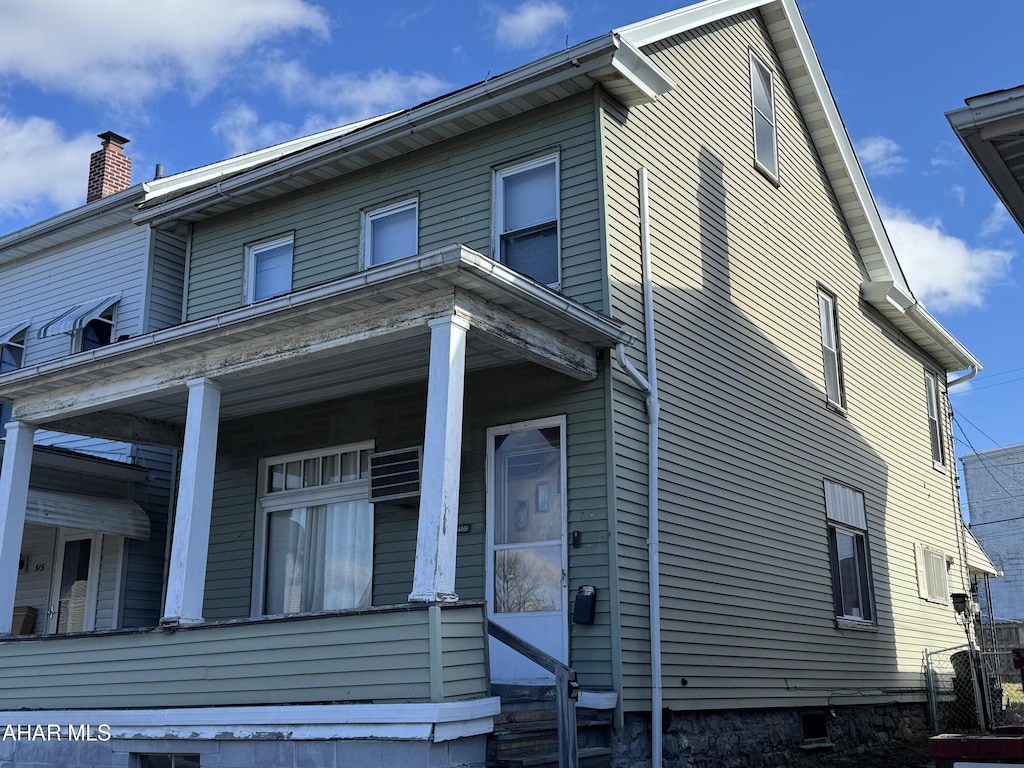 view of home's exterior featuring a porch