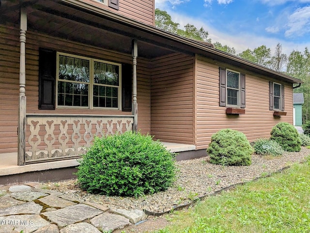 263 Helixville Rd, Schellsburg, PA 15559 - view of exterior entry featuring a porch