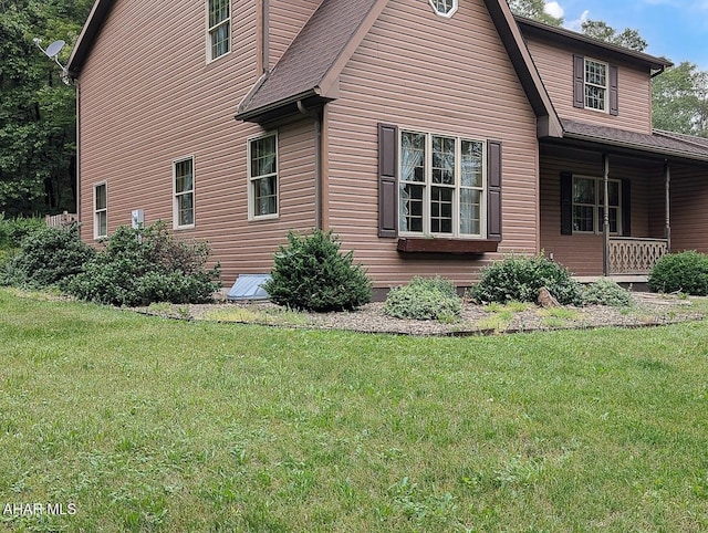 263 Helixville Rd, Schellsburg, PA 15559 - view of side of home featuring a yard and covered porch