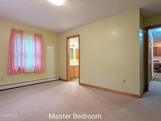 263 Helixville Rd, Schellsburg, PA 15559 - empty room with a baseboard radiator, light colored carpet, and a textured ceiling