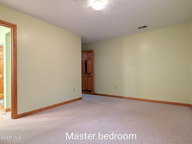 263 Helixville Rd, Schellsburg, PA 15559 - unfurnished room with light colored carpet and a textured ceiling