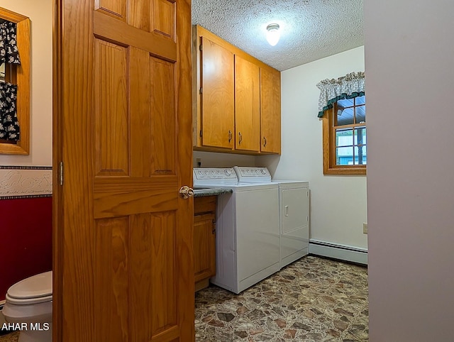 263 Helixville Rd, Schellsburg, PA 15559 - laundry area with washing machine and dryer, baseboard heating, cabinet space, and a textured ceiling