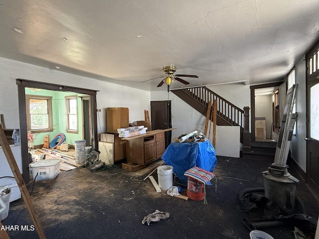 living room with ceiling fan