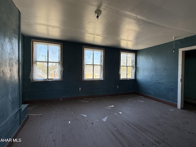 empty room featuring hardwood / wood-style floors