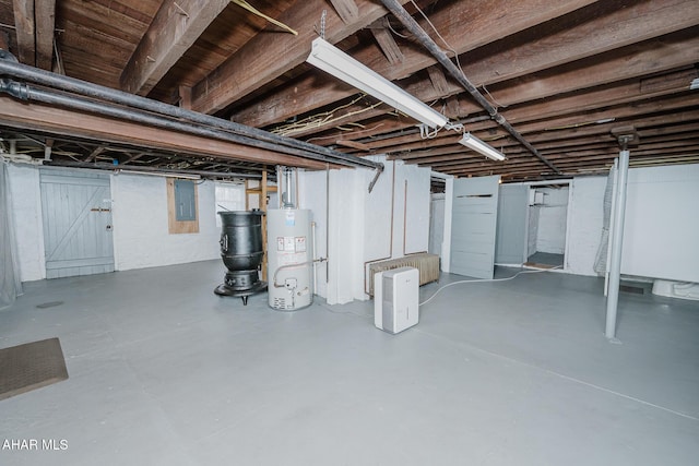 basement with water heater and electric panel