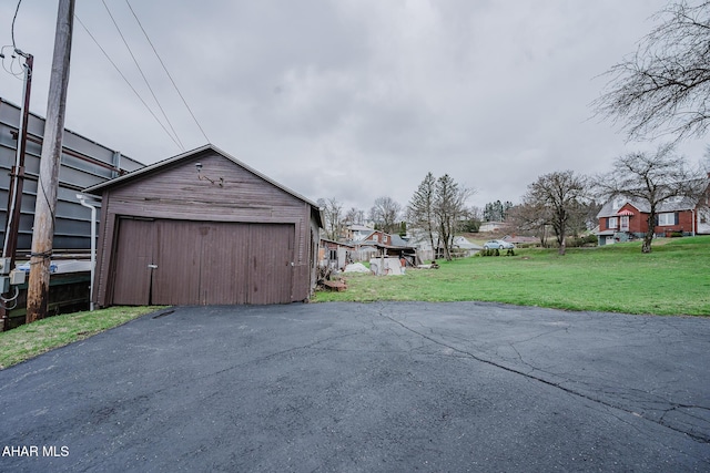 detached garage with a residential view