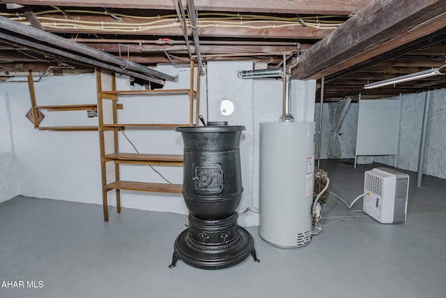 unfinished basement featuring gas water heater