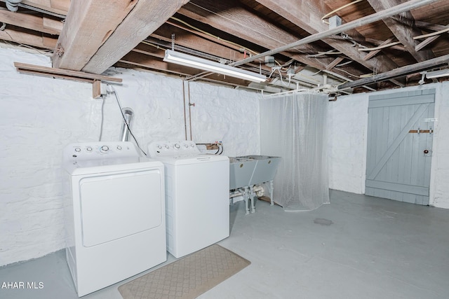washroom featuring independent washer and dryer
