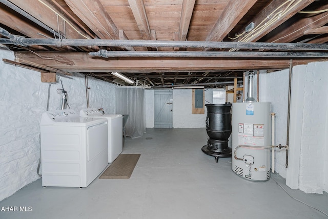 unfinished below grade area with water heater, washer and dryer, and electric panel