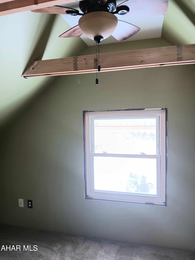 bonus room featuring a healthy amount of sunlight, carpet floors, a ceiling fan, and lofted ceiling