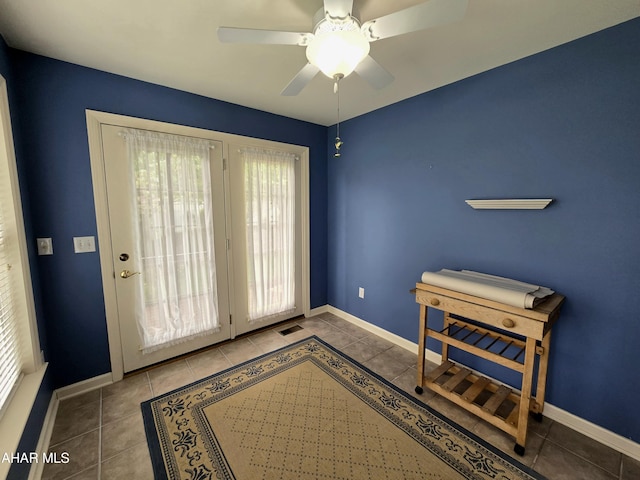 216 Red Fox Dr, Duncansville, PA 16635 - tiled entrance foyer with healthy amount of natural light, a ceiling fan, and baseboards