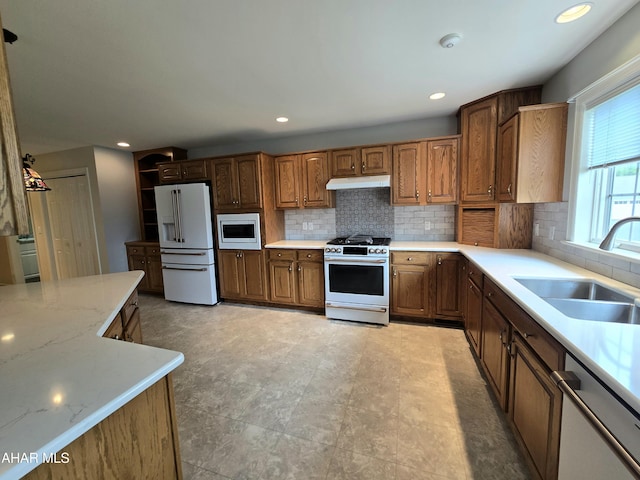 216 Red Fox Dr, Duncansville, PA 16635 - kitchen with high end white fridge, gas range, stainless steel microwave, under cabinet range hood, and dishwasher
