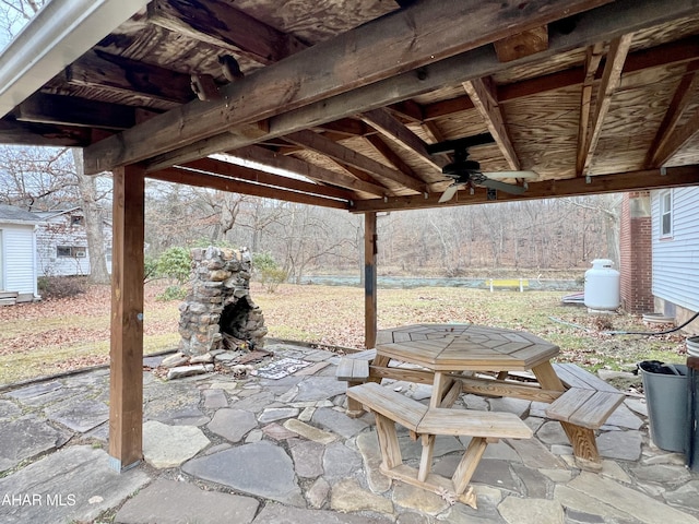 view of patio featuring ceiling fan